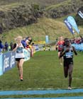 Emily Stewart (GB) finishing just behind 2011 World Cross Country Champion Viviab Cheruiyot during the Internation Womens 3k BUPA Great Edinburgh Cross country.